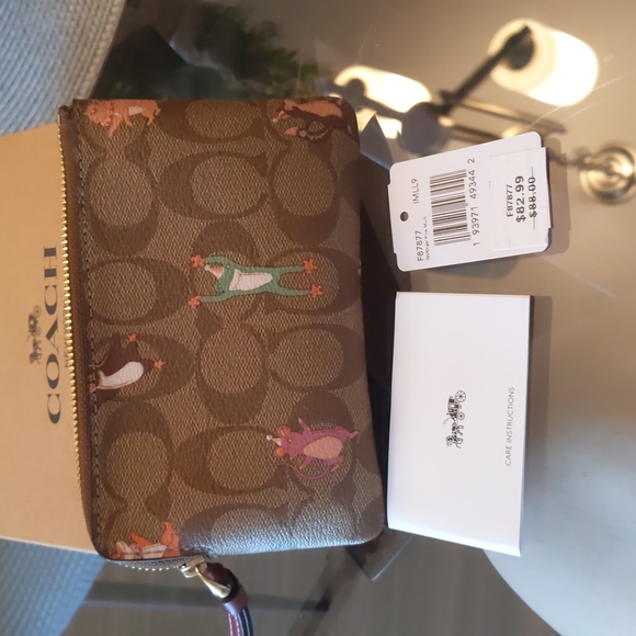 New with tags- small signature Coach wristlet - Picture 3 of 5